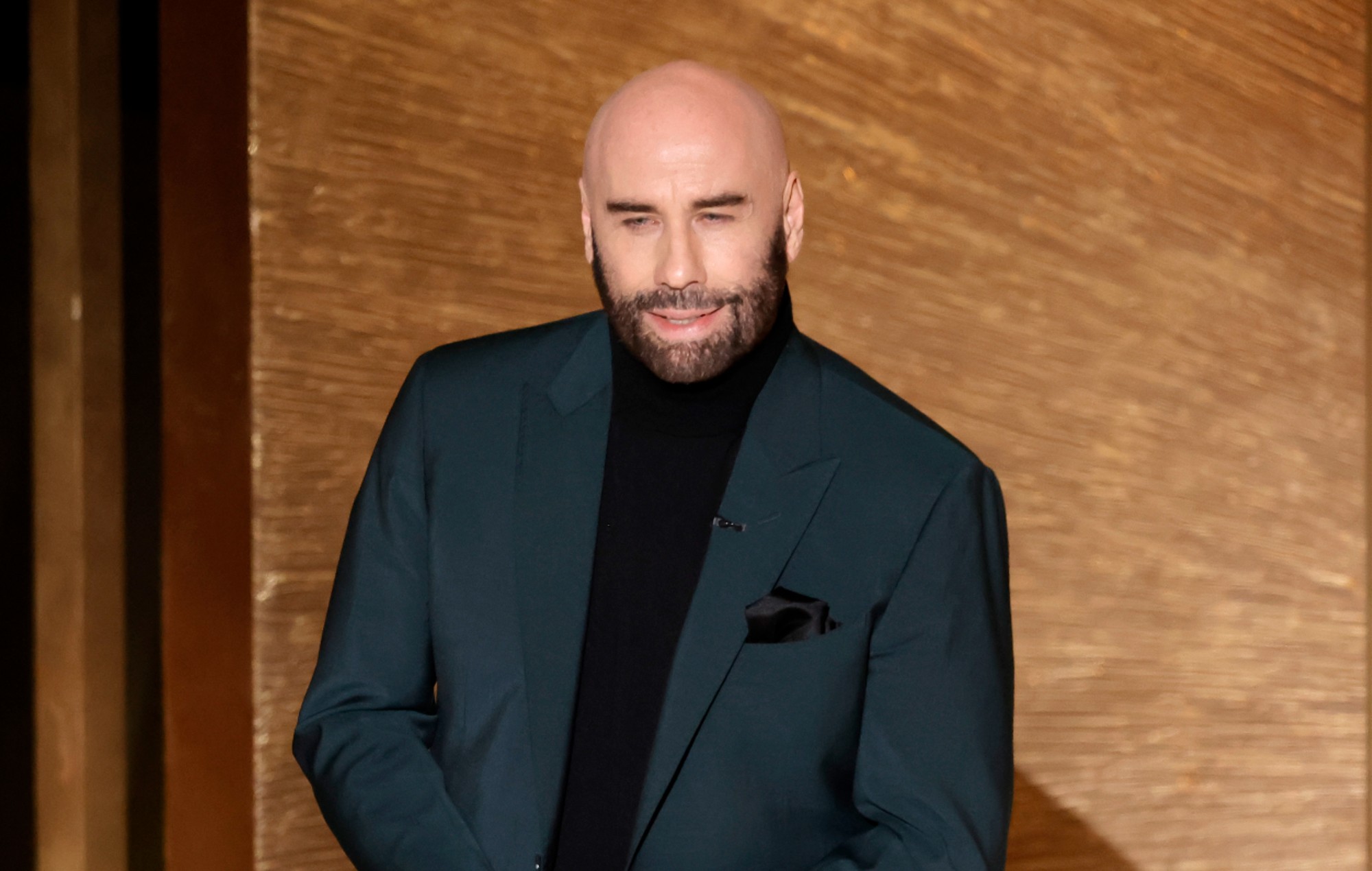 John Travolta gives emotional tribute to Olivia NewtonJohn at Oscars
